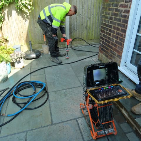 A Warrington drain services undertaking a drain incpection